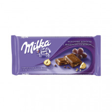 Шоколад MILKA З родзинками та лісовим горіхом 100г, 22шт/бл