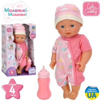 Пупс M 6185 I UA пьет-писающий, бутылочка, 4 песни, муз. (укр.), бат. (табл.), корр., 19-31-10 см.